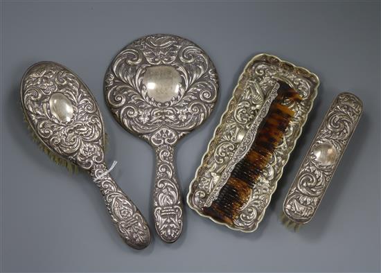 A silver-mounted matched dressing table set